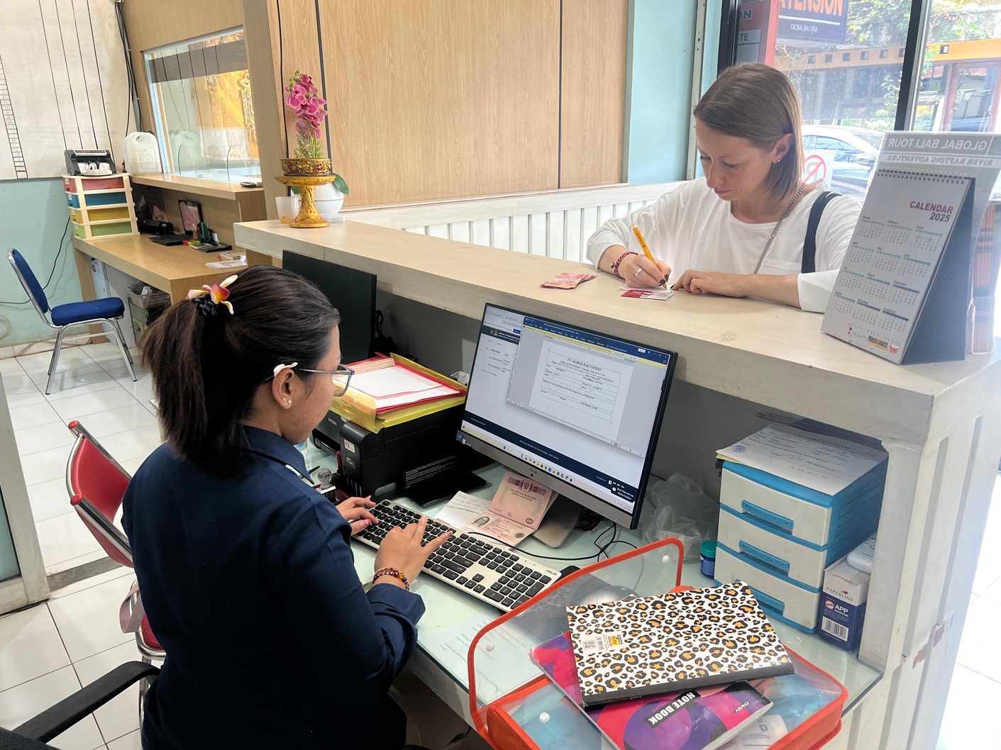 Two women working at a desk